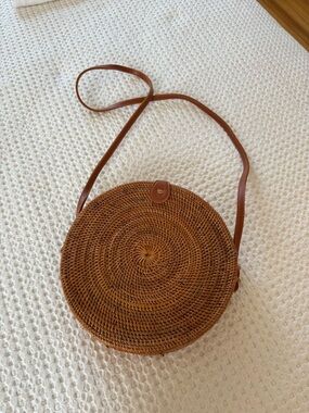 Round Woven Crossbody Bag in Brown